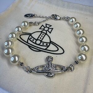 Vivienne Westwood orb and faux pearl bracelet new with dust bag